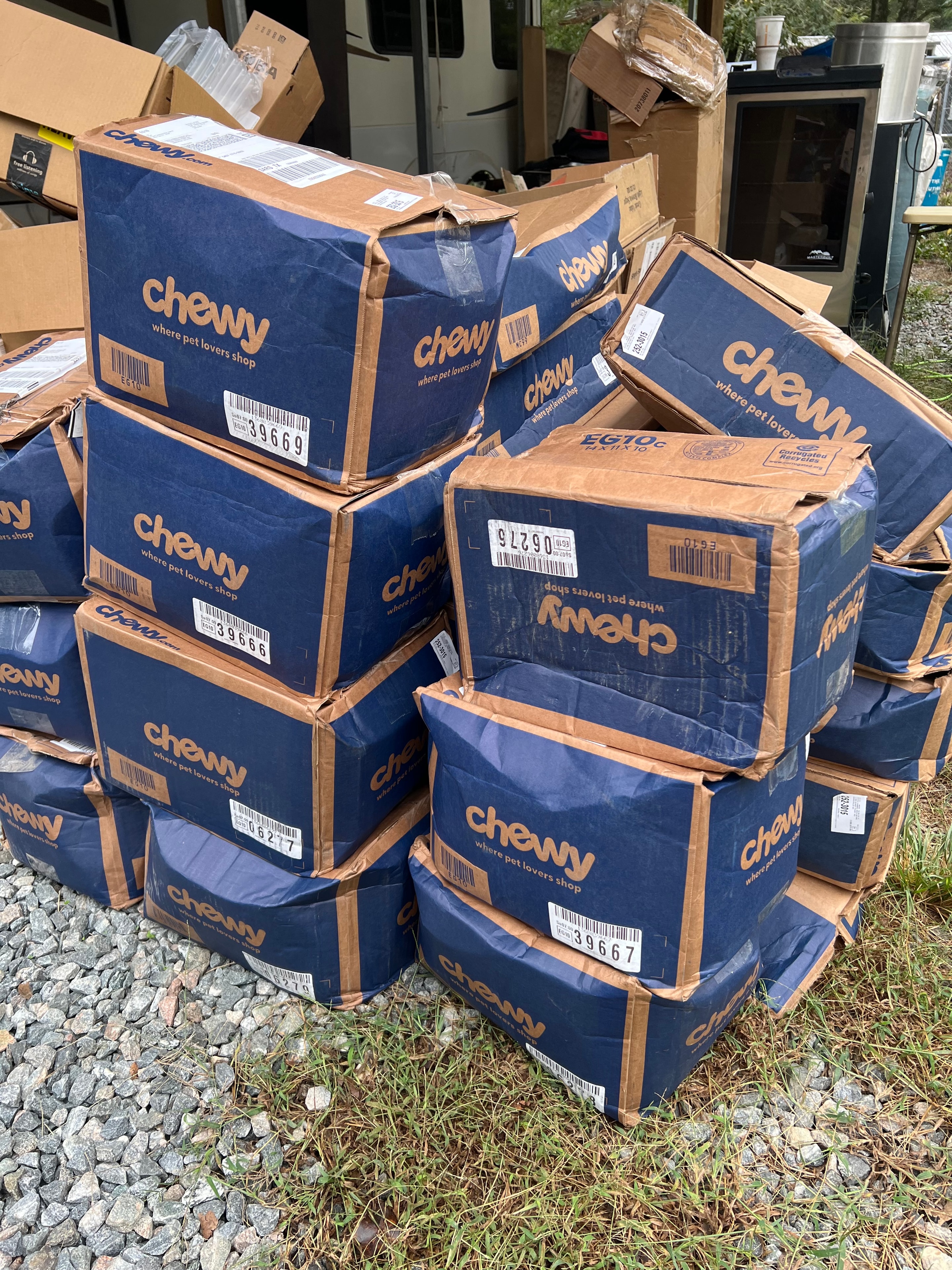 Chewy boxes of donated pet supplies